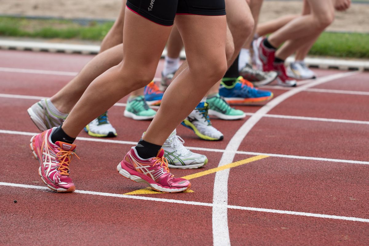 Sprinters in starting blocks on a track